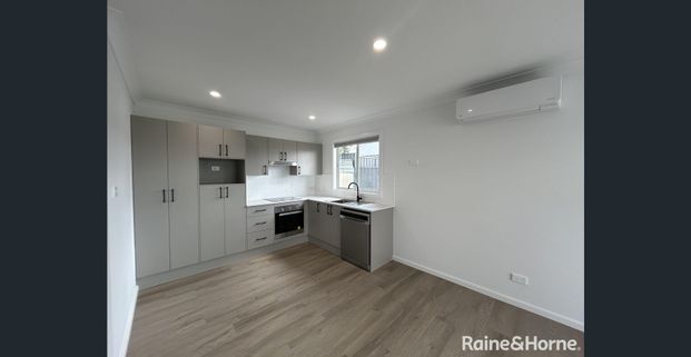 Brand New Modern 2 Bedroom home with Lock Up Garage - Photo 1