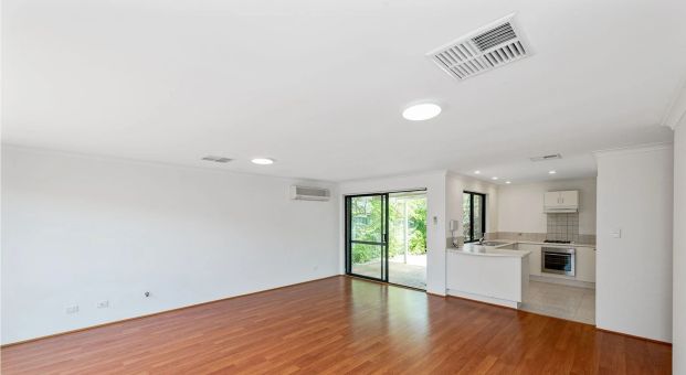 Freshly Painted Villa in Perfect Location - Photo 1