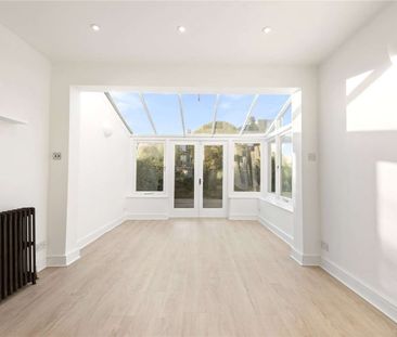 A lovely family home with grand proportions and a wider than averag... - Photo 5