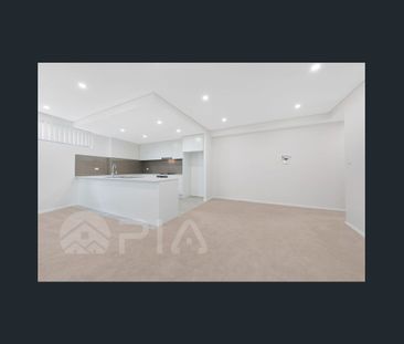SPACIOUS TWO BEDROOM APARTMENT WITH LARGE COVERED BALCONY - Photo 1