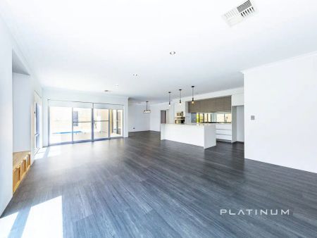 “Spacious 4-Bedroom Family Home with Pool – Walk to Burns Beach” - Photo 2