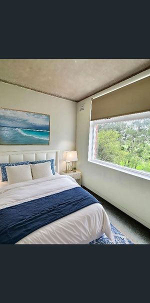 Bright Coastal Apartment with Leafy Outlooks - Photo 1