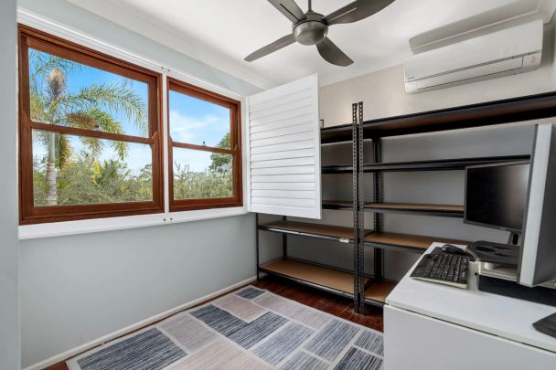 Spacious 4-Bedroom Family Home with Modern Comforts - Photo 1