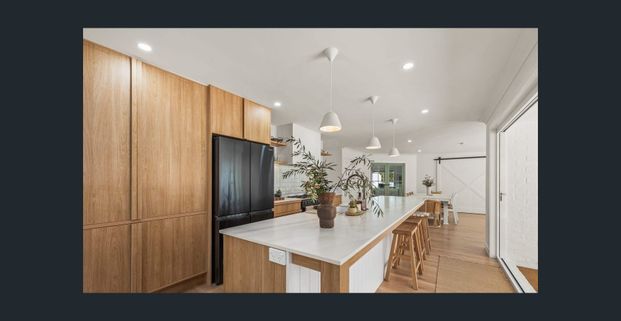 COMING SOON Beautifully Renovated 5-Bedroom Family Home in the Heart of Helensvale - Photo 1