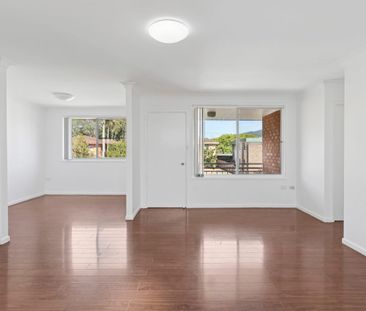 Freshly Updated Three-Bedroom Unit in Prime Coastal Location - Photo 1