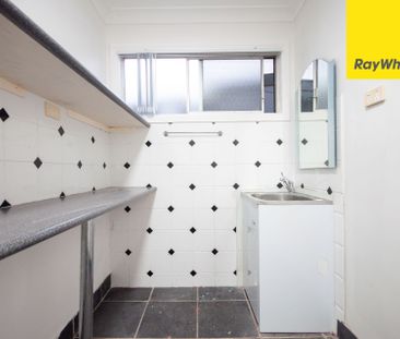FRESHLY UPDATED FOUR-BEDROOM FAMILY HOME IN A CONVENIENT LOCATION - Photo 1