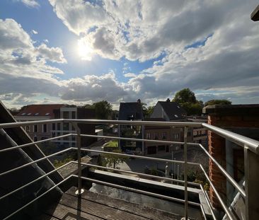 Gezellig duplexappartement in het centrum van Beveren met twee slaa... - Photo 1