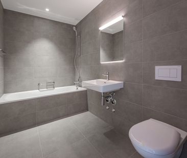 "Moderne 2.5-Zimmer-Neubauwohnung im Römerpark" - Photo 5