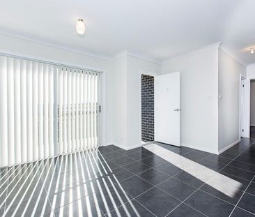 Low maintenance living - Photo 5