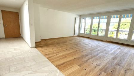 Wohnung mit Weitsicht auf umliegende Berge und Seeblick - Foto 3