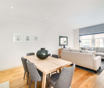 This spacious mews house situated within the gated development that... - Photo 5