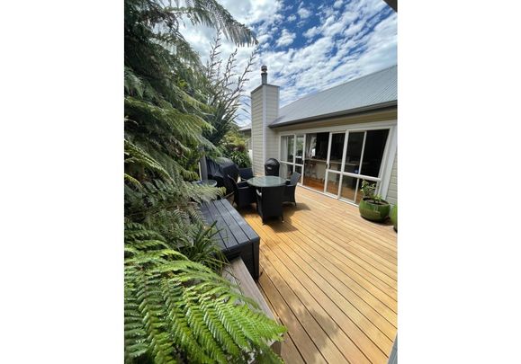 Family home nestled into the native bush - Photo 1