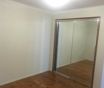 Charming 3-Bedroom Home with a Spacious Backyard! - Photo 2