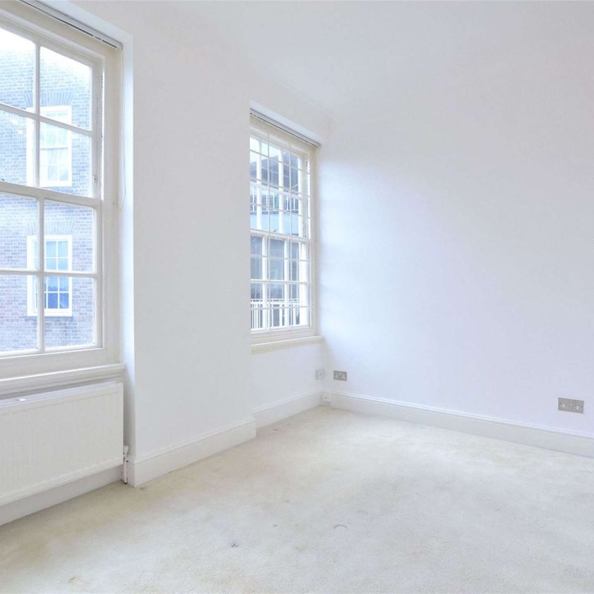 Large two bedroom, two bathroom apartment with a terrace set within a portered block moments St. John's Wood High Street - Photo 1