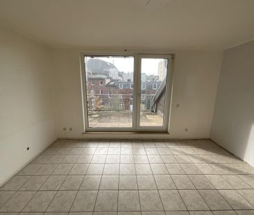 Gemütliche Dachgeschosswohnung mit Schrägen und Terrasse - Foto 1