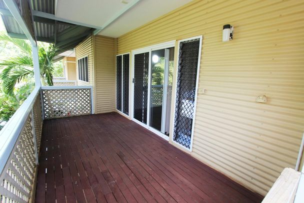 Elevated 5-Bedroom Home with Decked Balconies & Dual Living Spaces - Photo 1