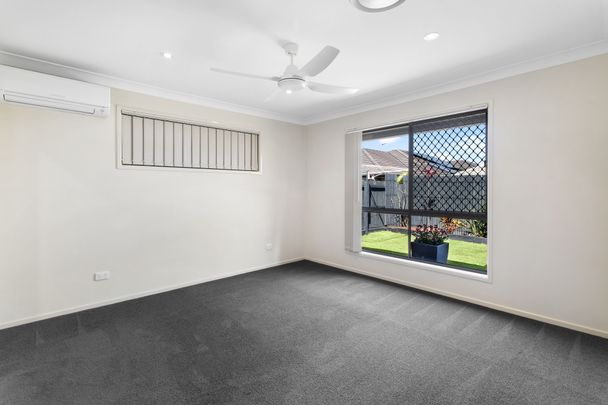 SPACIOUS 4 BEDROOM WITH ALL THE EXTRAS - 2 LIVING AREAS, DUCTED A/C AND SOLAR! - Photo 1