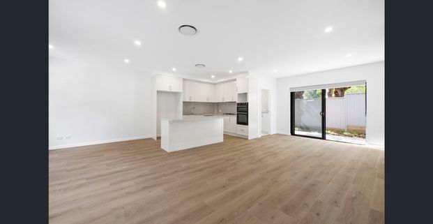 Modern Brand New 3-Bedroom Townhouse - Photo 1