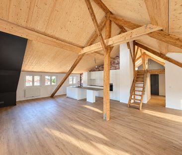Superb apartment in the attic in the old town of Moutier - Photo 1