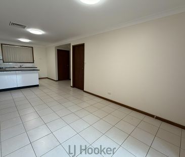 Stylish Two-Bedroom Townhouse � End Unit Convenience - Photo 1