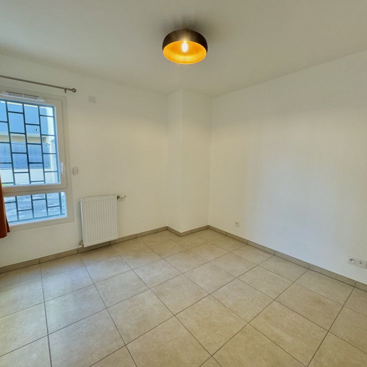 Appartement T3 en rez de jardin BOURGOIN JALLIEU - Photo 1