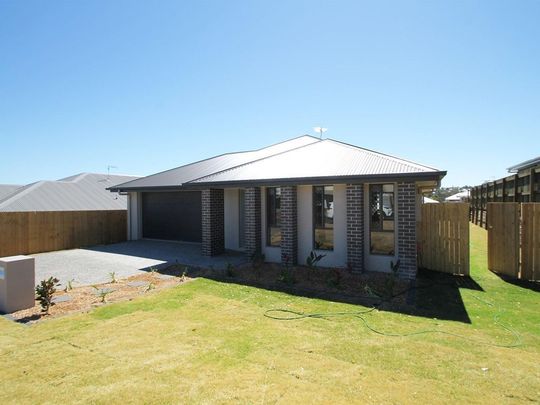 Modern 4-Bedroom Home in Sought-After Harristown Estate - Photo 1