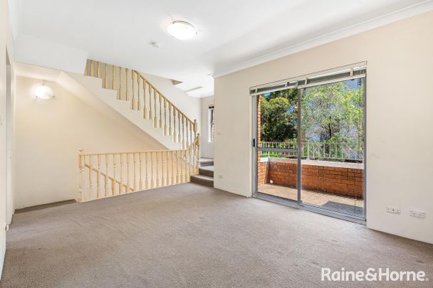 Spacious Two-Bedroom Townhouse in a Convenient Location - Photo 1