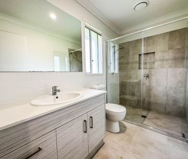 Spacious & Modern Family Home in Popular Location - Photo 1