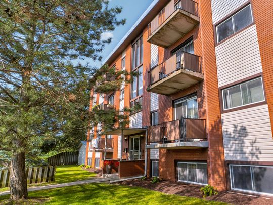 Hugo Place Apartments - PARKING SPACE, WATER & HEAT INCLUDED - Photo 1