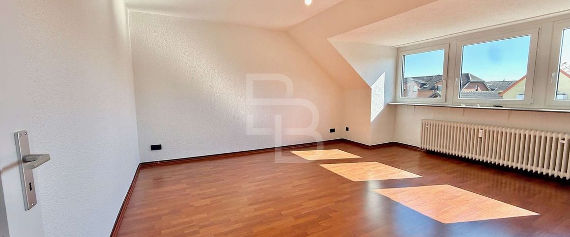 Gemütliche Dachgeschosswohnung in zentraler Lage von Ensen! - Photo 1