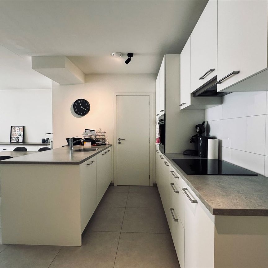 Gelijkvloers appartement met onderhoudsvriendelijke tuin - Foto 1
