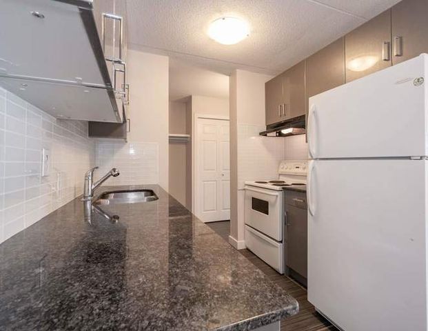 West Wynd Court | 16527 Stony Plain Rd NW, Edmonton - Photo 1