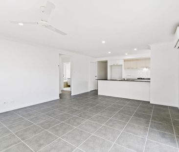 YOUR NEW FAMILY HOME AWAITS YOU! - Photo 1