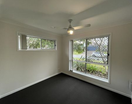 Private Oasis Backing Onto Bushland – Spacious Family Living in Prime Location - Photo 3