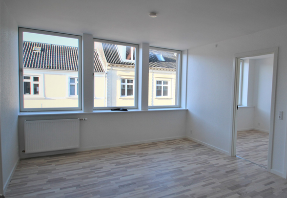 Dejlig lejlighed med central placering - Foto 1