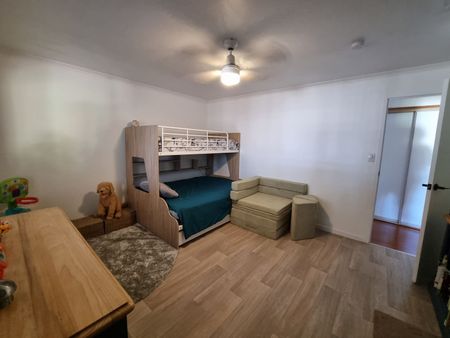 A rare find in town - Solid brick home with a double bay shed - Photo 3