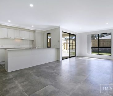 QUIET ESCAPE IN WEST END! A MUST INSPECT! - Photo 1