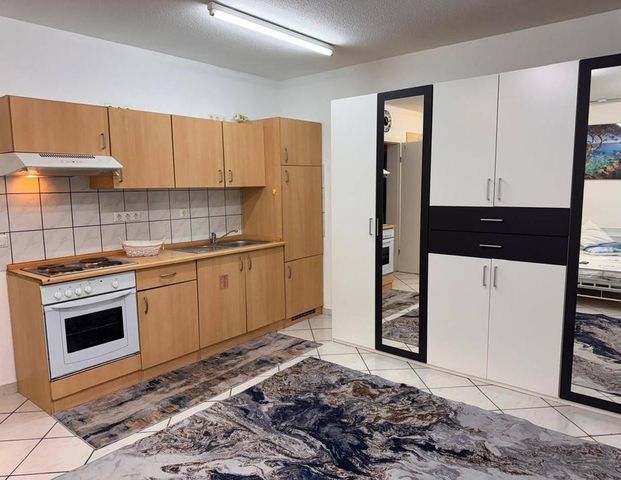 Modern Apartment mit Küche und Möbel in beste Lage - Foto 1