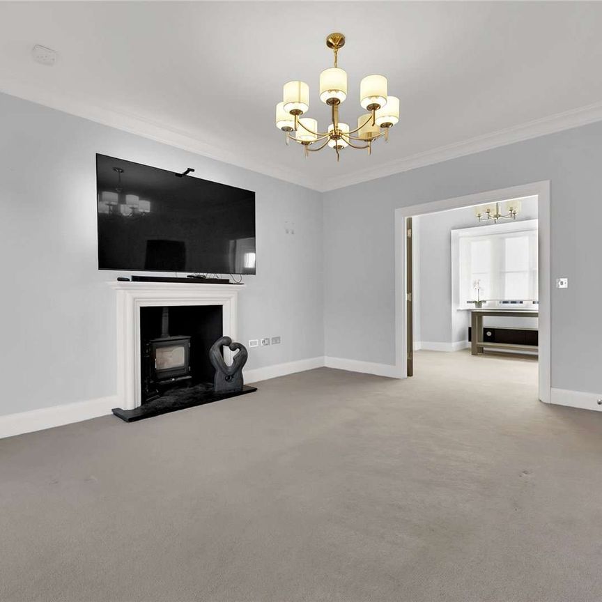 A beautifully appointed five bedroom detached home by PH Homes, set within an exclusive Alderley Park development and extending to over 2,250 sq ft across three floors - Photo 1