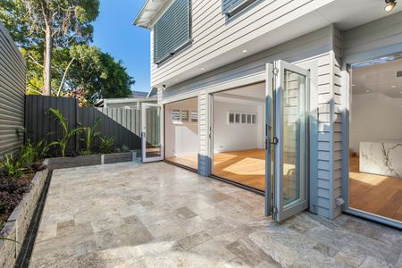 Register to Inspect // Timeless Elegance Meets Contemporary Coastal Living - Photo 4