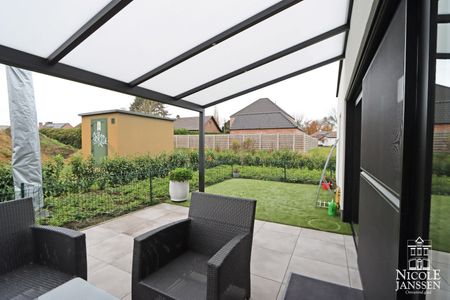 Mooi gelijkvloers nieuwbouwappartement met terras, ondergrondse autostaanplaats en kelderberging - Photo 3