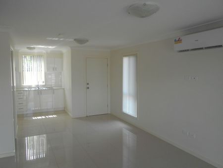 Three Bedroom Townhouse In Convenient Location - Photo 2