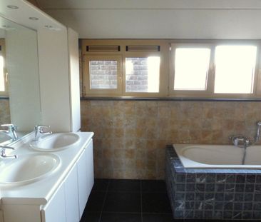 Duplex-app. met 2 slpk., terras en garage in Herk-de-Stad. - Photo 6