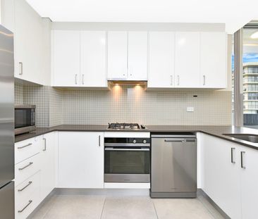 Top-Floor Penthouse with Dual Balconies | District Views - Photo 5