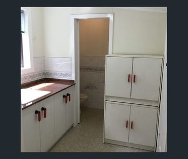 Charming Cottage in a Prime Location! - Photo 1