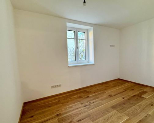 Erstbezug: Traumhafte Wohnung mit Sauna und Garten - Foto 1