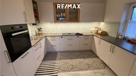 Großzügige Erdgeschoßwohnung in einer Landhausvilla mit Seeblick - Foto 4