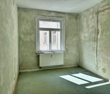 Erstbezug nach Komplettsanierung: 4-Raumwohnung mit Wintergarten in... - Photo 2
