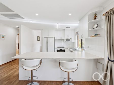 Open the Door to Easy-Care Living with Modern Comfort - Photo 2