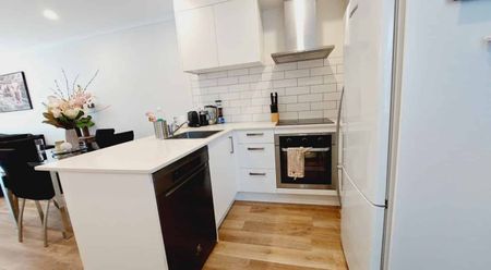 Stylish 2-Bedroom Home with Modern Comforts & Private Outdoor Spaces - Photo 3